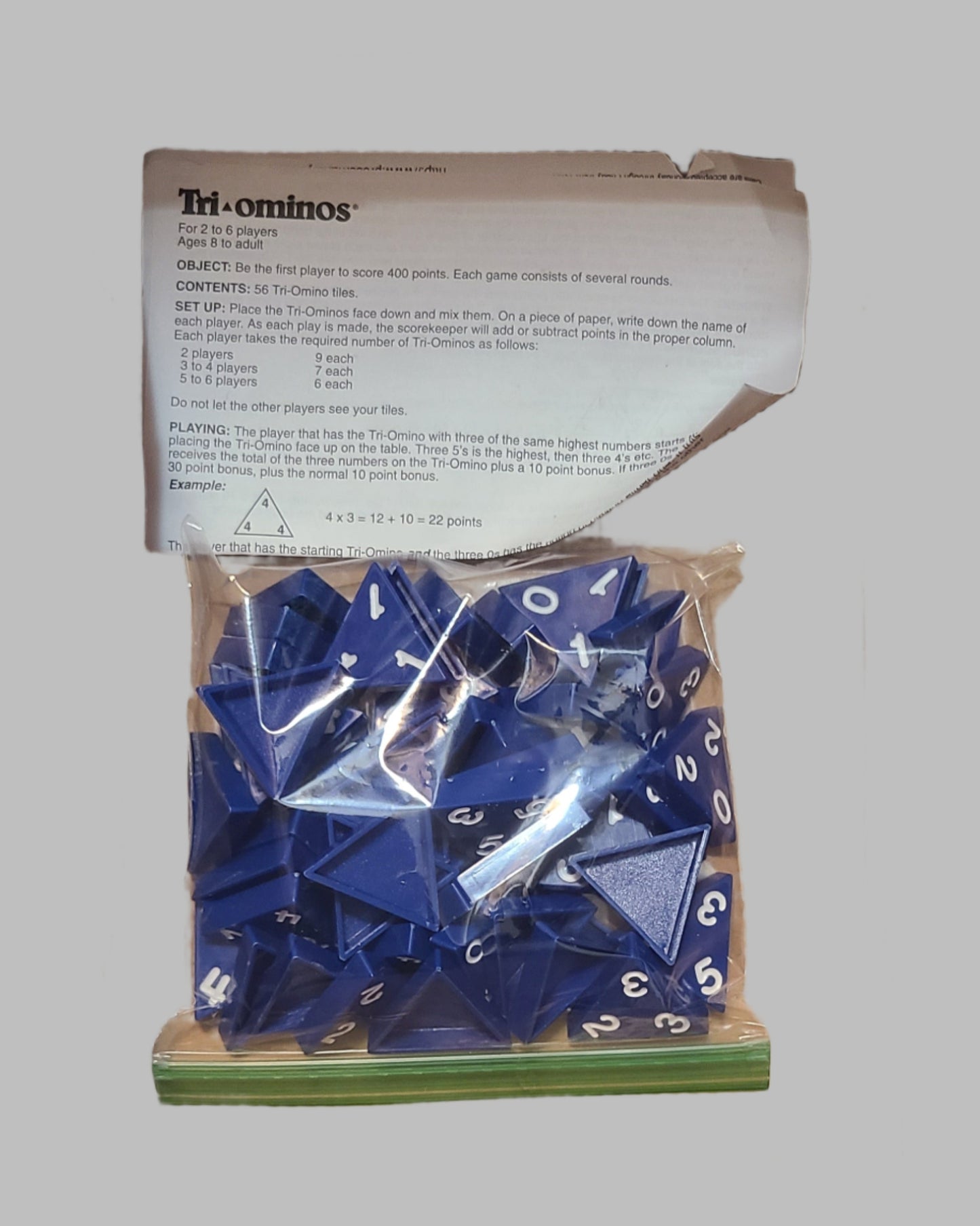 Tri-Ominos The Classic Triangular Domino Game - Copyright 2007 - USED