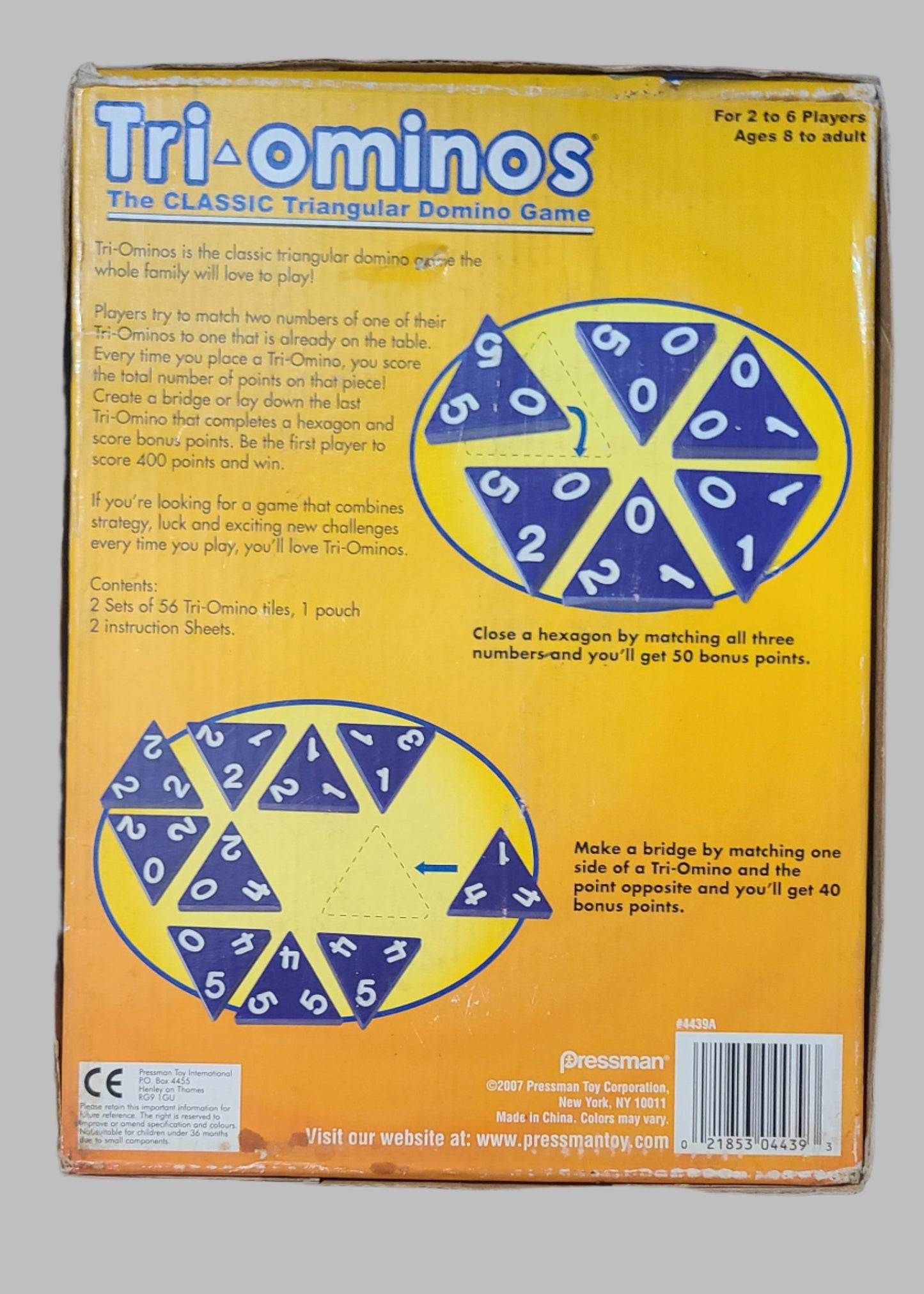 Tri-Ominos The Classic Triangular Domino Game - Copyright 2007 - USED