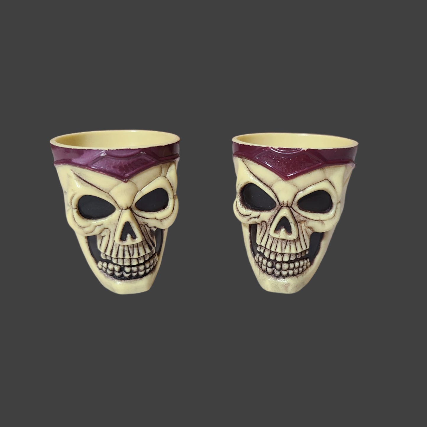 VTG Easter Unlimited Plastic Skull Shot Glass Set of 2 - USED