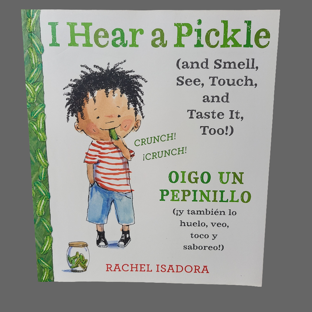 SC I Hear a Pickle (and Smell, See, Touch, and Taste It, Too!) - Oigo Un Pepinillo (Y Tambien Lo Huelo, Veo, Toco Y Saboreo!) - By Rachel Isadora - Copyright 2016 - LIKE NEW